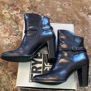 Frye black leather ankle boots with buckle detail.